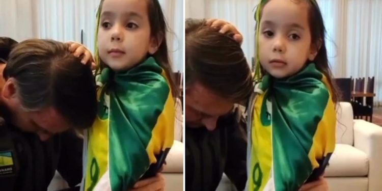 Vestida com a bandeira do Brasil, criança ora por Bolsonaro e comove web